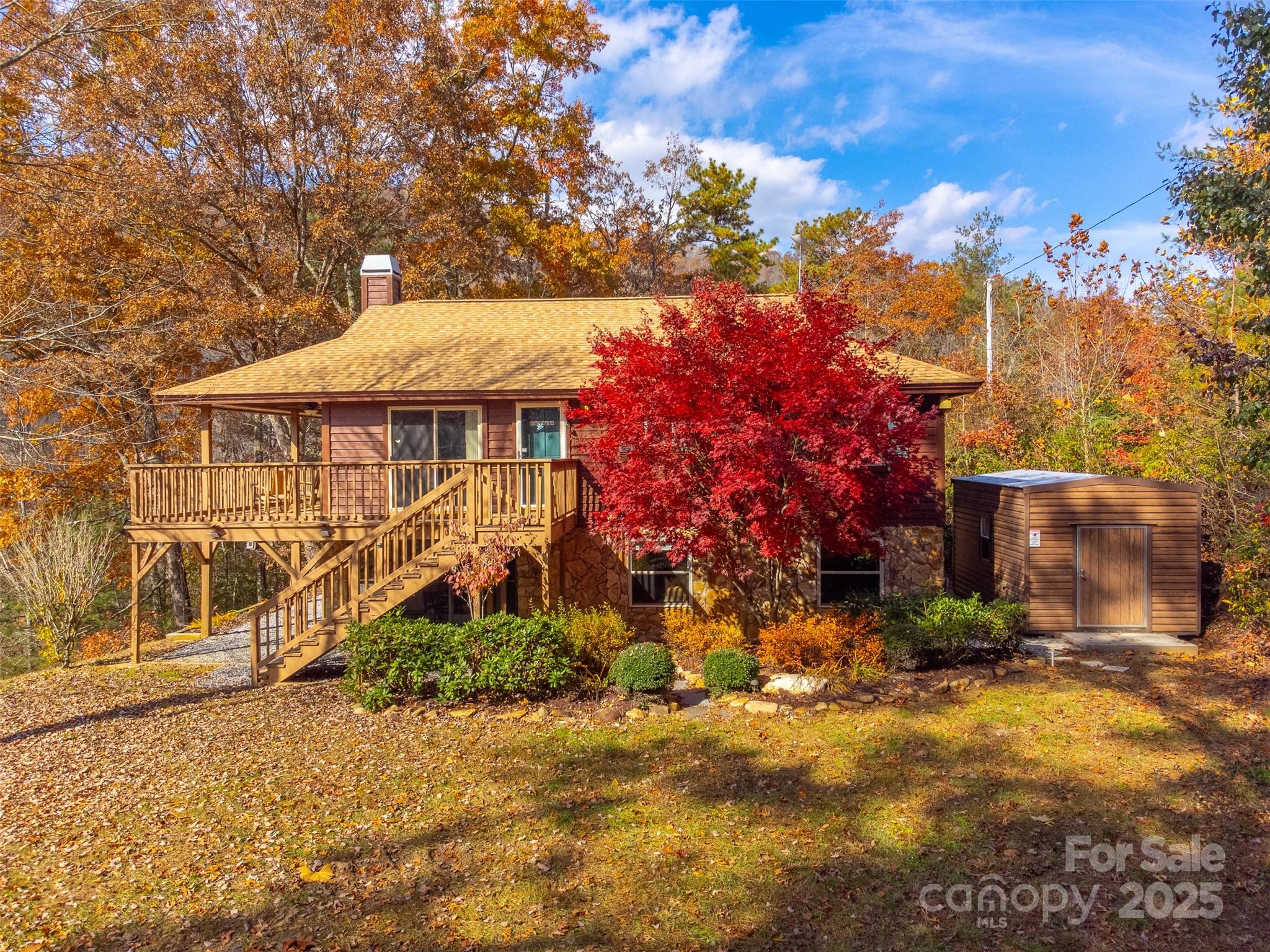 2311 Alarka Road Bryson City, NC 28713 - Photo 3 of 47 front view of a house with a yard