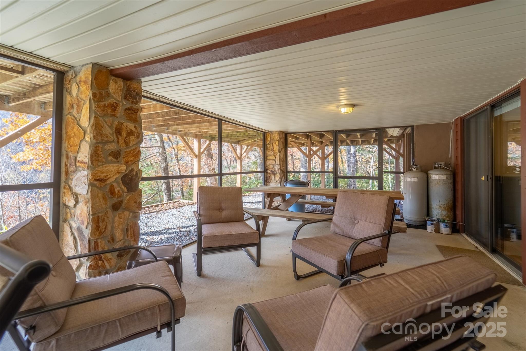 2311 Alarka Road Bryson City, NC 28713 - Photo 41 of 47 a balcony with furniture and large windows