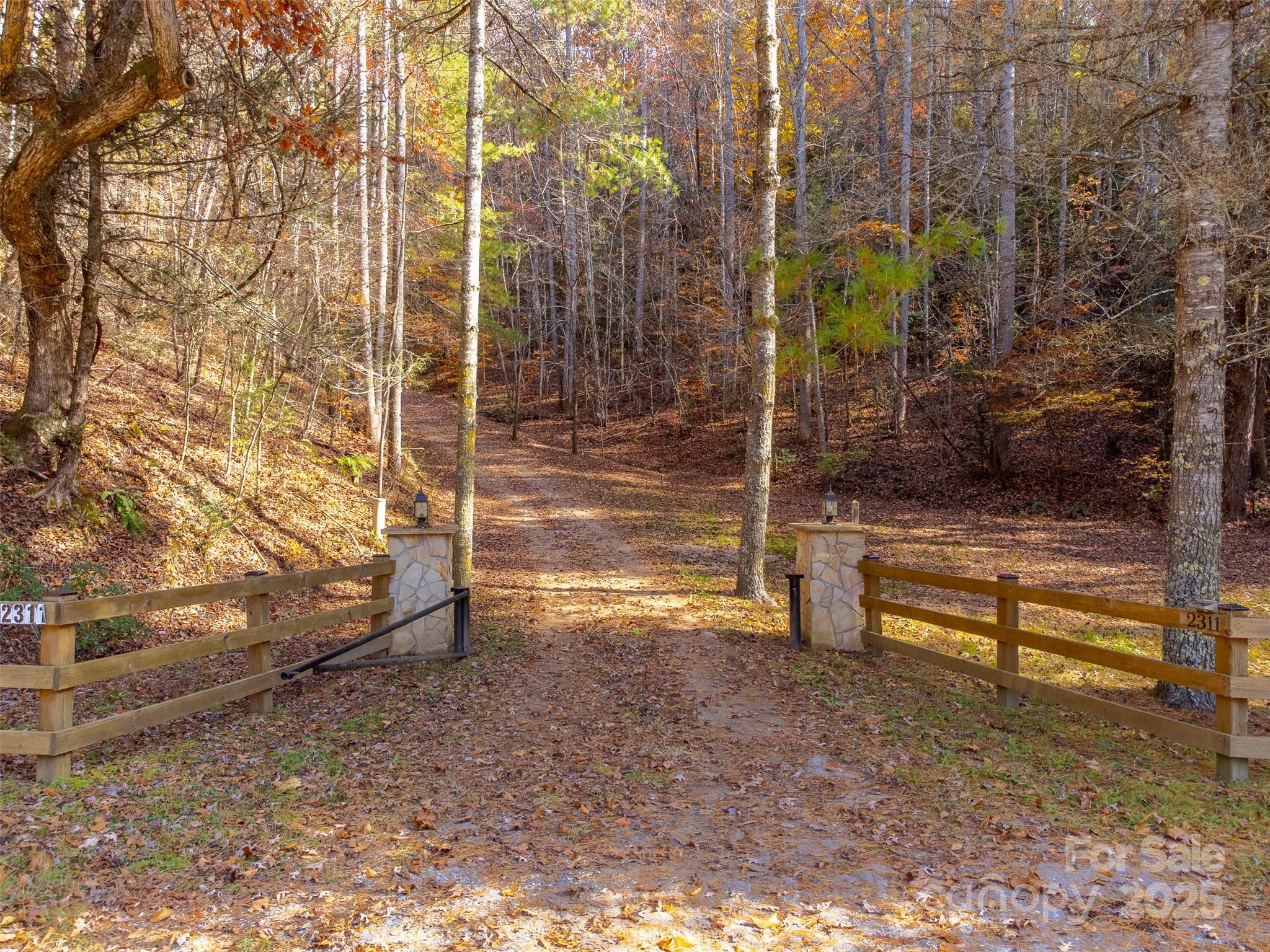 2311 Alarka Road Bryson City, NC 28713 - Photo 43 of 47 a backyard of a house with lots of green space