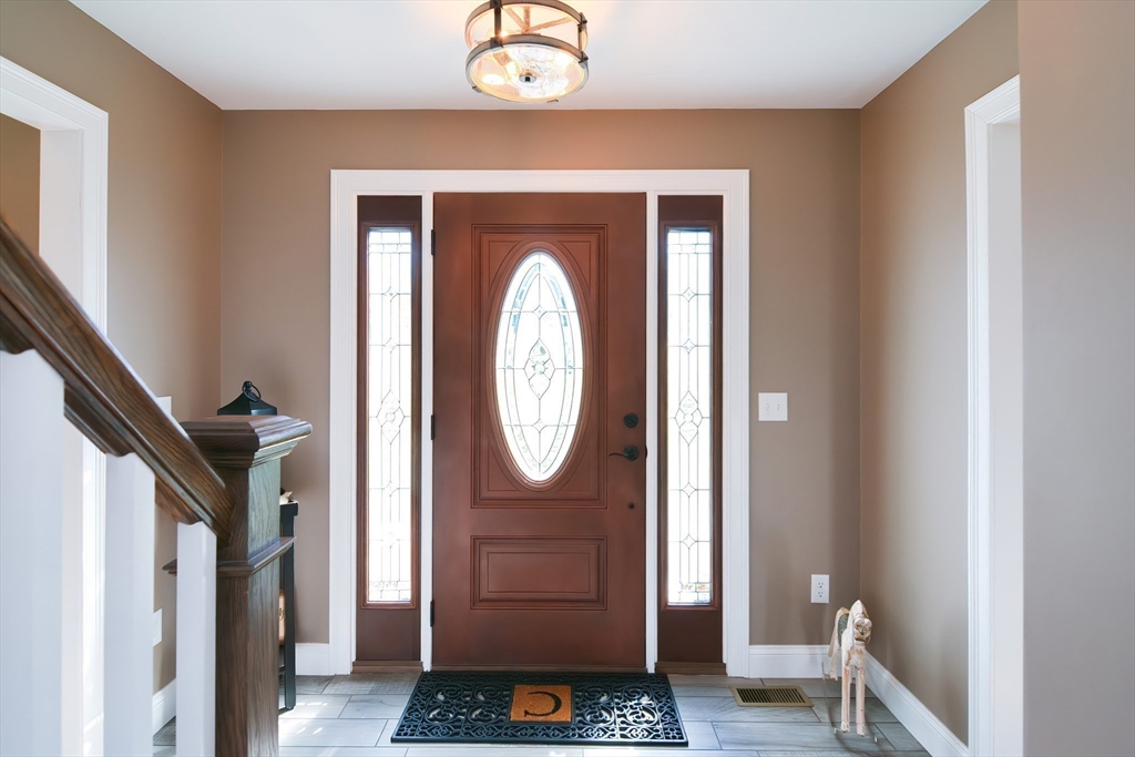 310 Main Street Rutland, MA 01543 - Photo 2 of 39 a view of entryway with wooden floor