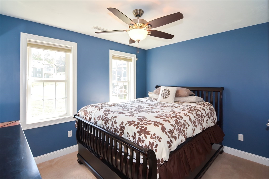 310 Main Street Rutland, MA 01543 - Photo 29 of 39 a bedroom with a bed and window