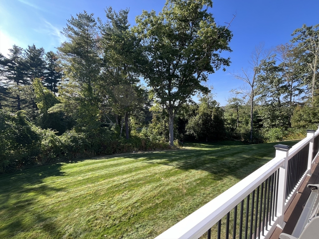 310 Main Street Rutland, MA 01543 - Photo 35 of 39 a view of a field of grass and a tree