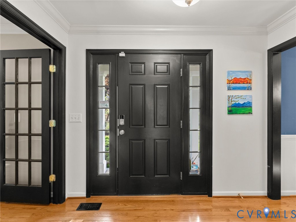 126 Reedy Creek Road Louisa, VA 23093 - Photo 15 of 68 Entryway featuring a black paneled door with sidel