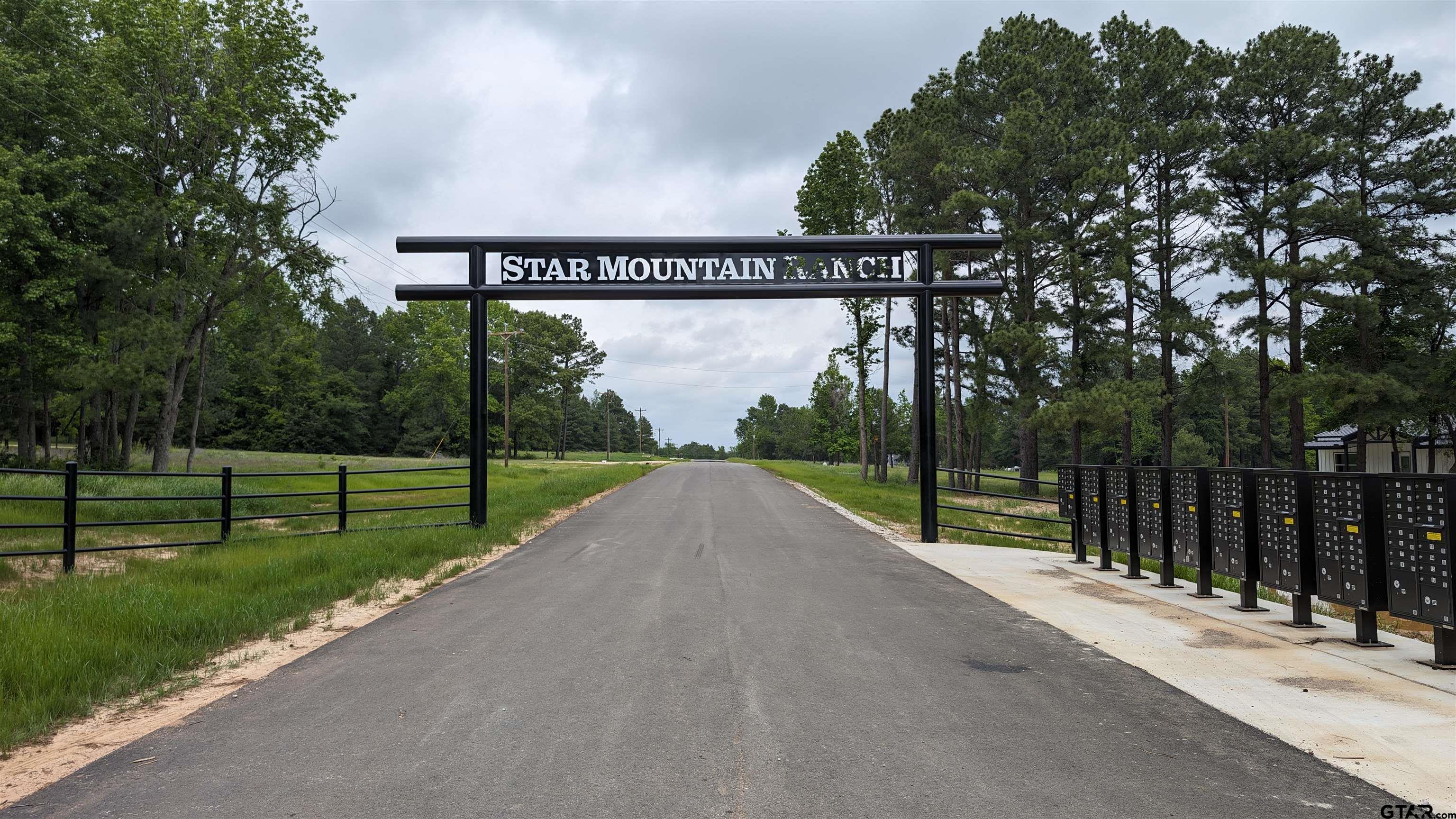 16832 Ridgeline Loop Winona, TX 75792 - Photo 6 of 6 a view of a street with a park view