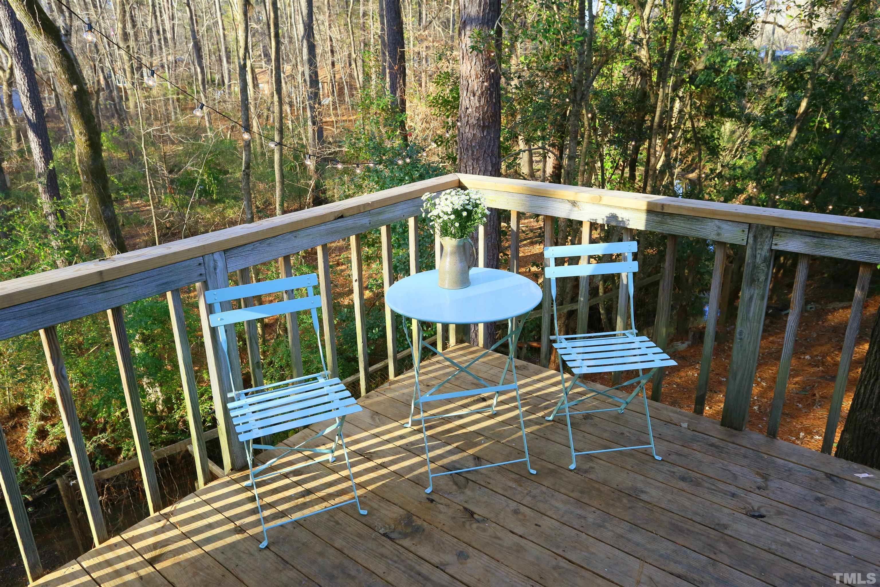 13 Williams Durham, NC 27704 - Photo 17 of 23 a view of a deck with wooden floor and outdoor seating