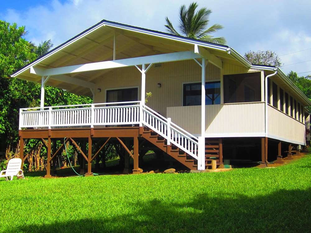 570 West Kuiaha Road, Unit 1 Haiku, HI 96708 - Photo 8 of 27 a view of a house with backyard and deck