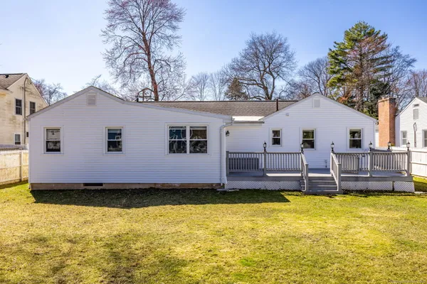 a view of a house with swimming pool and porch