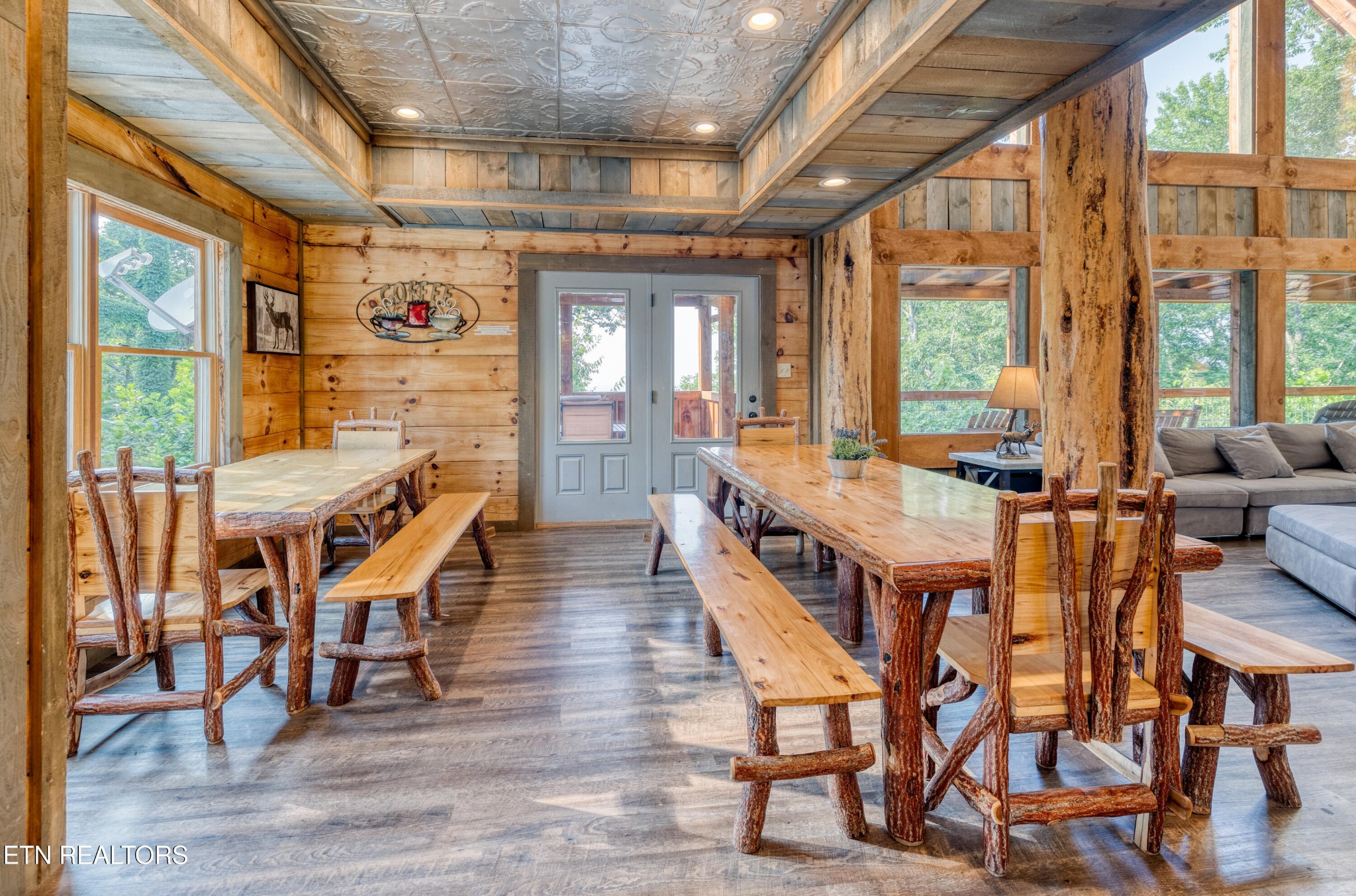 809 Pinecrest Way Sevierville, TN 37862 - Photo 7 of 60 a view of a dining room with furniture window and wooden floor