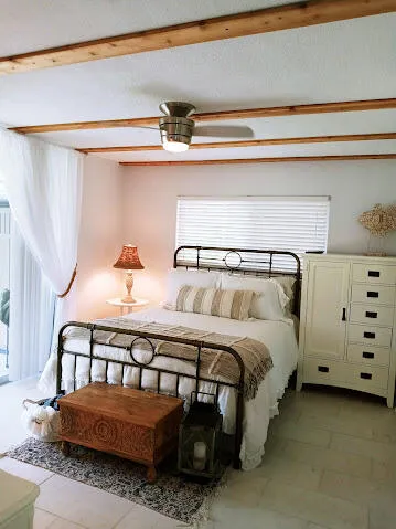 a bedroom with a bed and a walk in closet