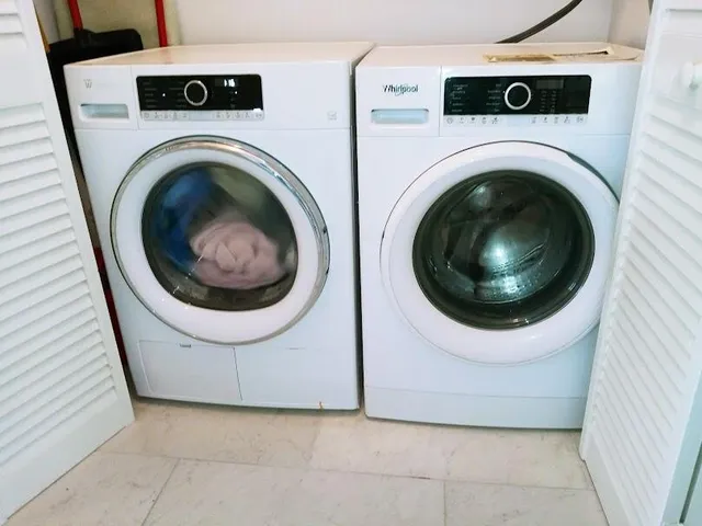 a utility room with dryer and washer