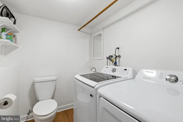 a bathroom with a sink a toilet and a tub
