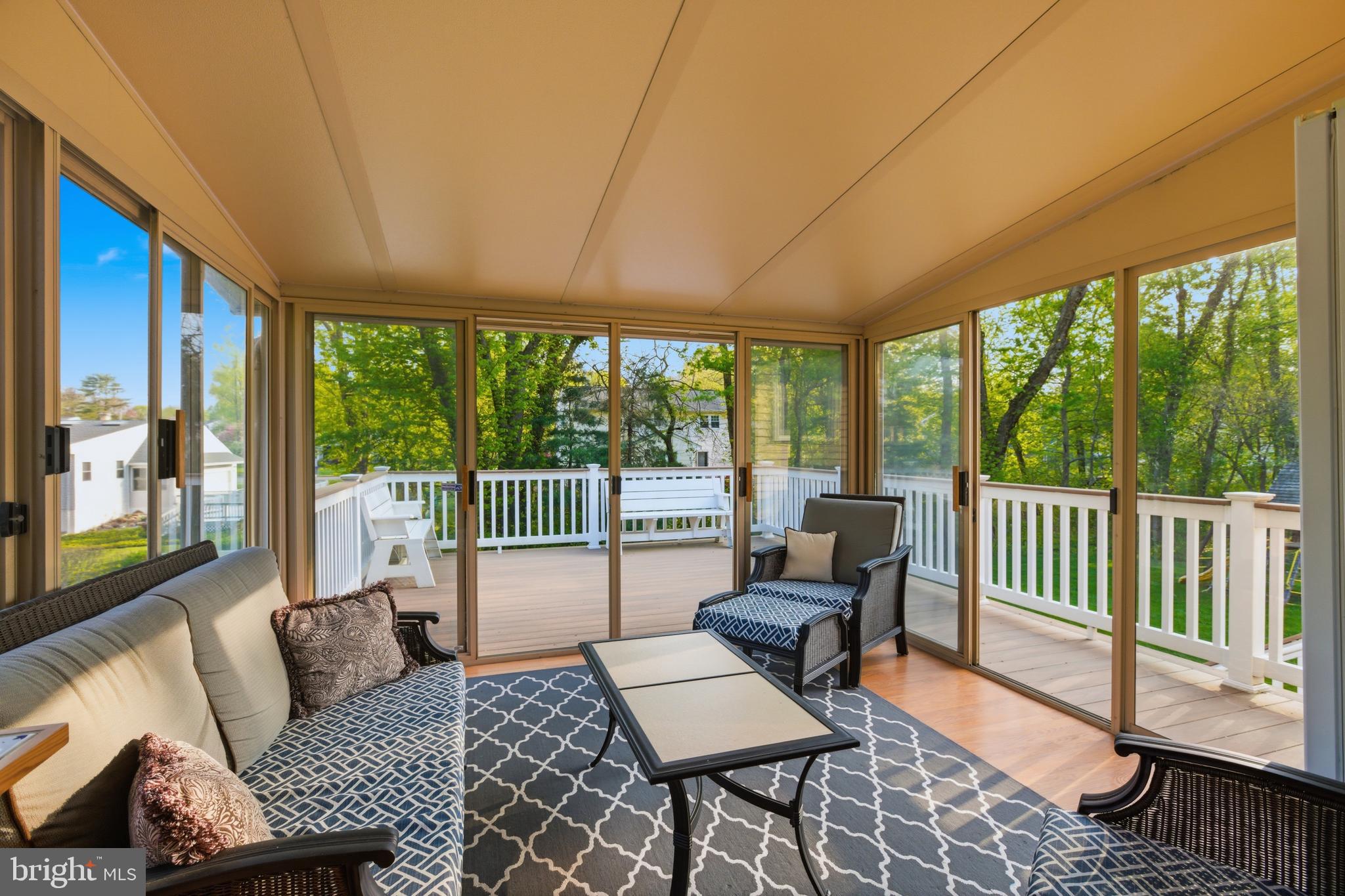 194 Bull Run Road Ewing, NJ 08638 - Photo 26 of 29 a living room with furniture and a floor to ceiling window