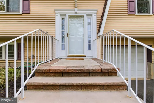 a view of a balcony with door