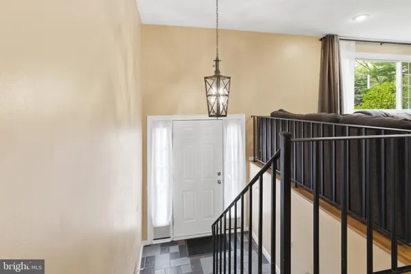 a view of a hallway with windows