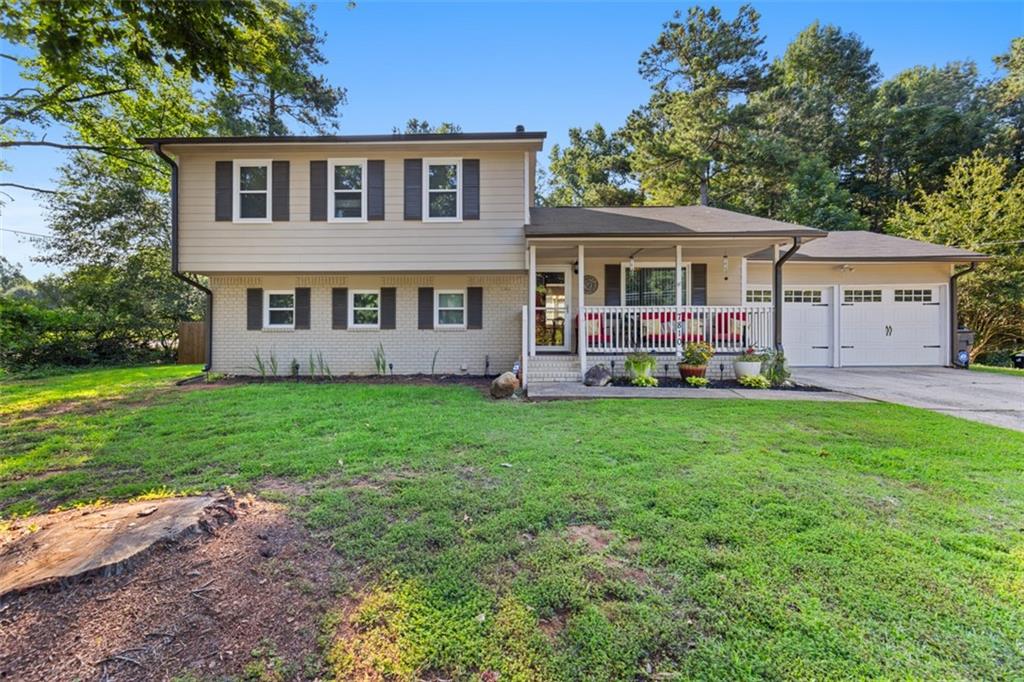7810 Fielder Road Jonesboro, GA 30236 - Photo 1 of 1 a view of a house with yard and front view of a house
