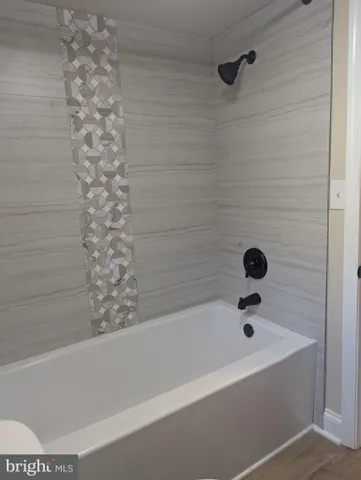 a bathroom with a bathtub