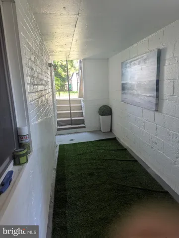 a bathroom with a sink and a window