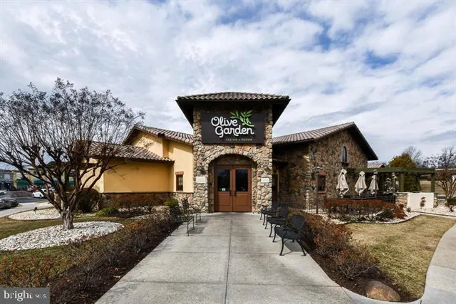 a view of a street with lots of trees