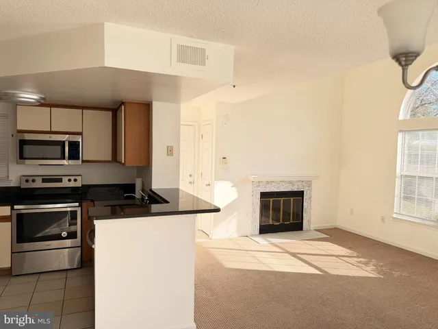 a bathroom with a toilet sink and shower