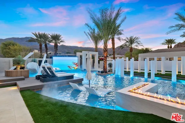 a view of a yard with a patio