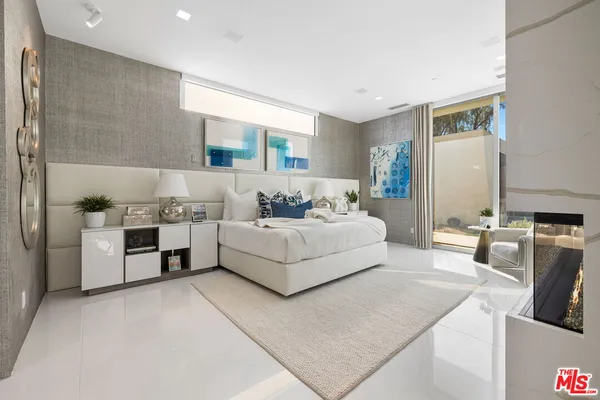 a spacious bathroom with a tub shower and sink