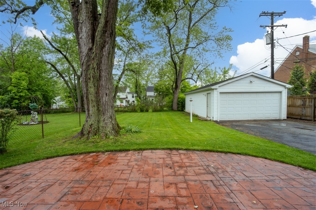 1492 Lyndhurst Road Lyndhurst, OH 44124 - Photo 31 of 32 View of yard featuring a detached garage