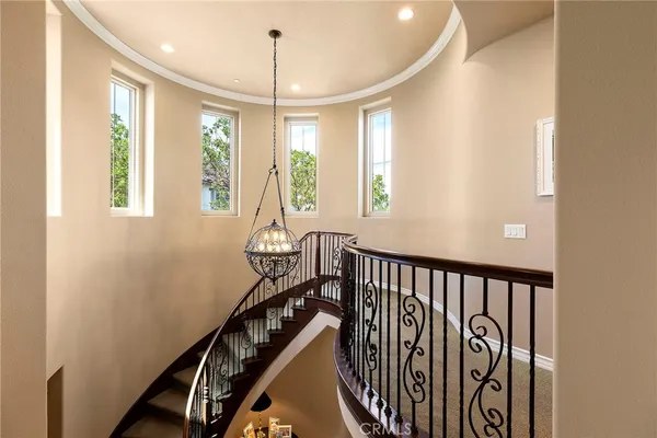 a view of a hallway with seating area