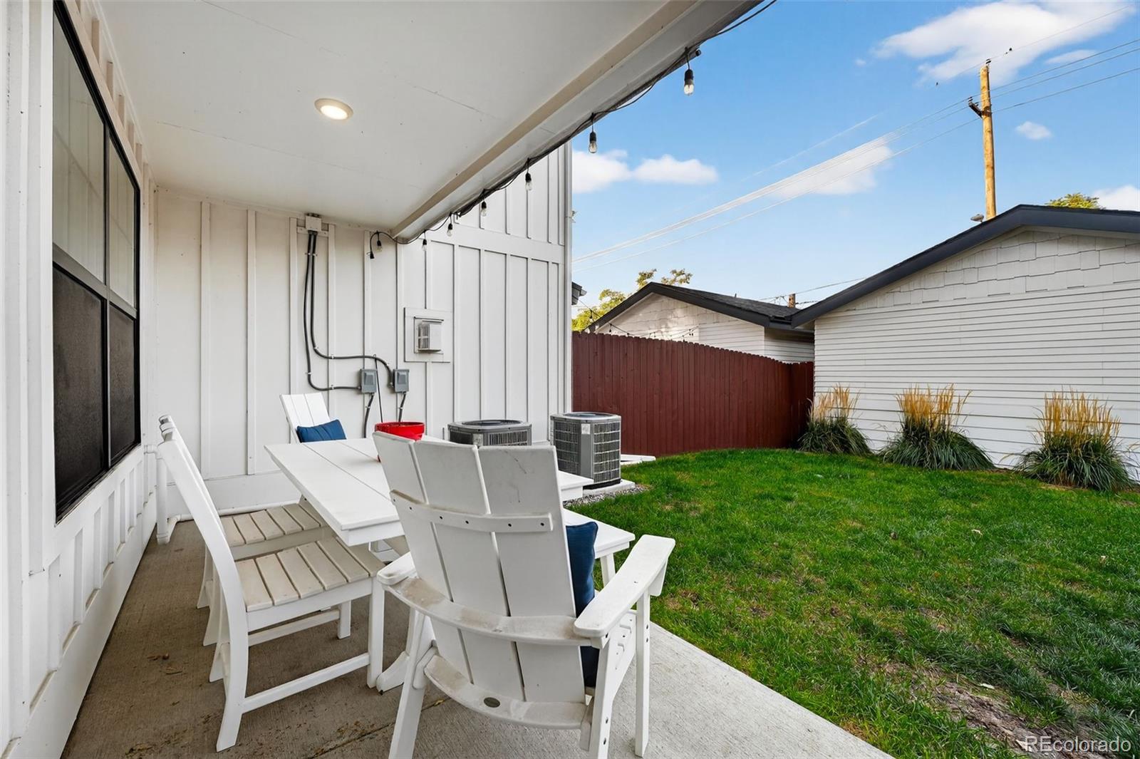 4035 Osage Street Denver, CO 80211 - Photo 28 of 29 a view of an chairs and table in the patio