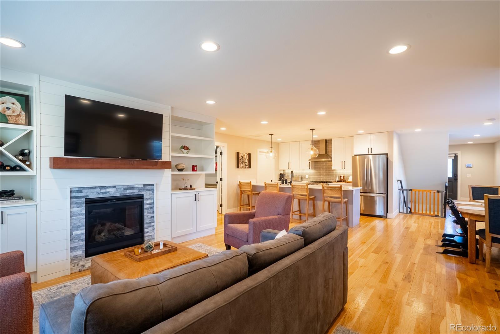 4035 Osage Street Denver, CO 80211 - Photo 5 of 29 a living room with furniture and a fireplace