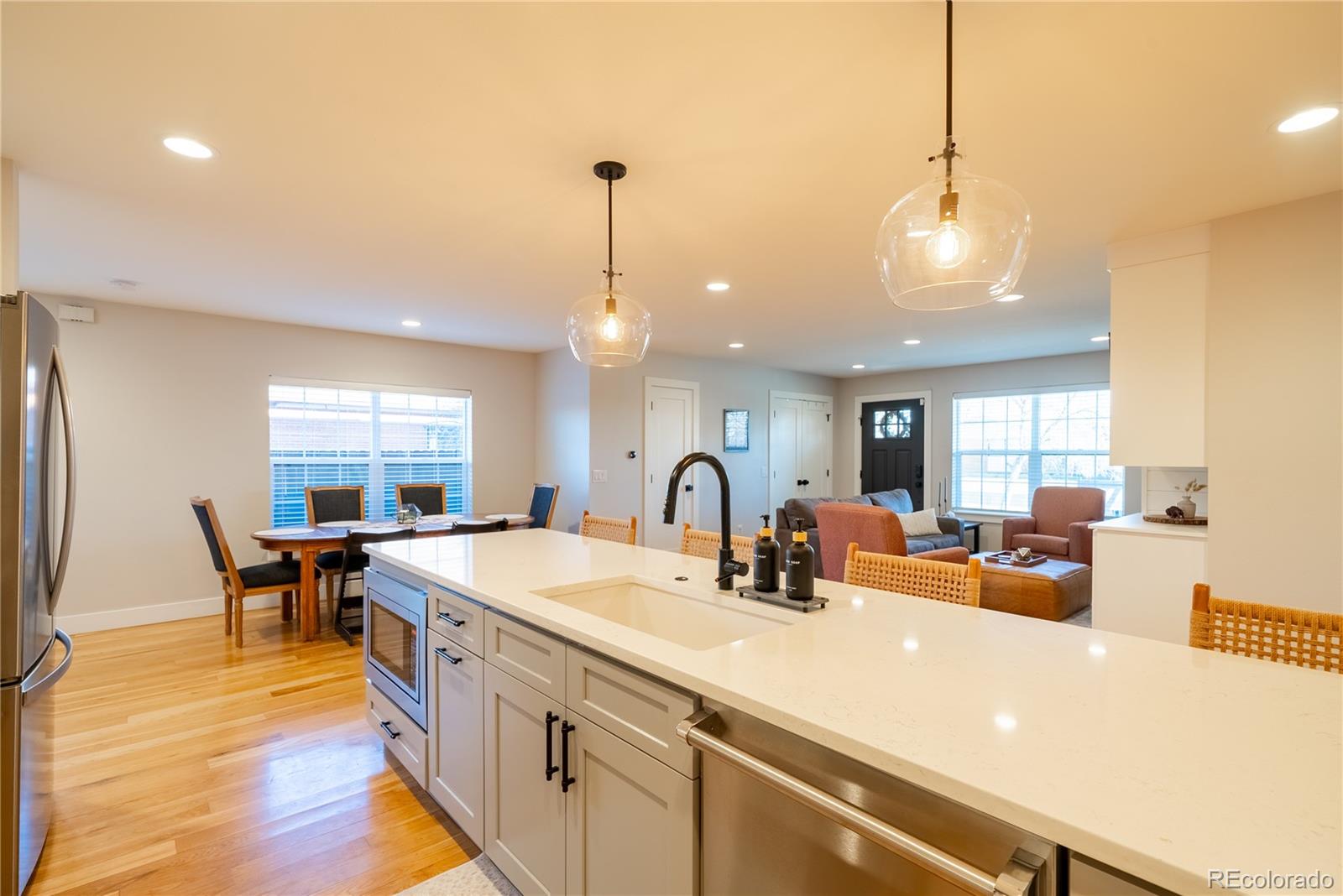 4035 Osage Street Denver, CO 80211 - Photo 7 of 29 a view of a kitchen and dining room