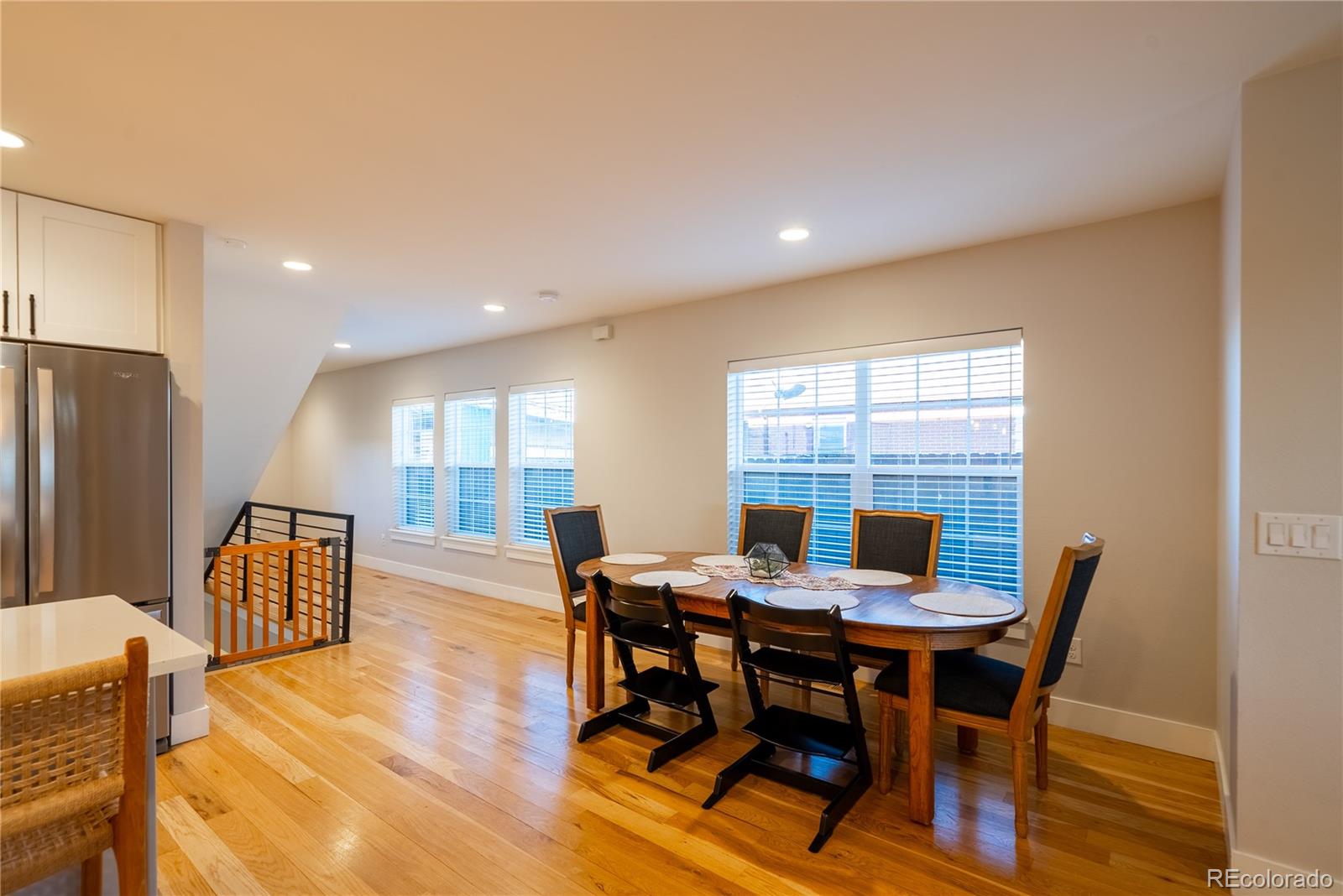 4035 Osage Street Denver, CO 80211 - Photo 9 of 29 a view of a dining room with furniture window and wooden floor