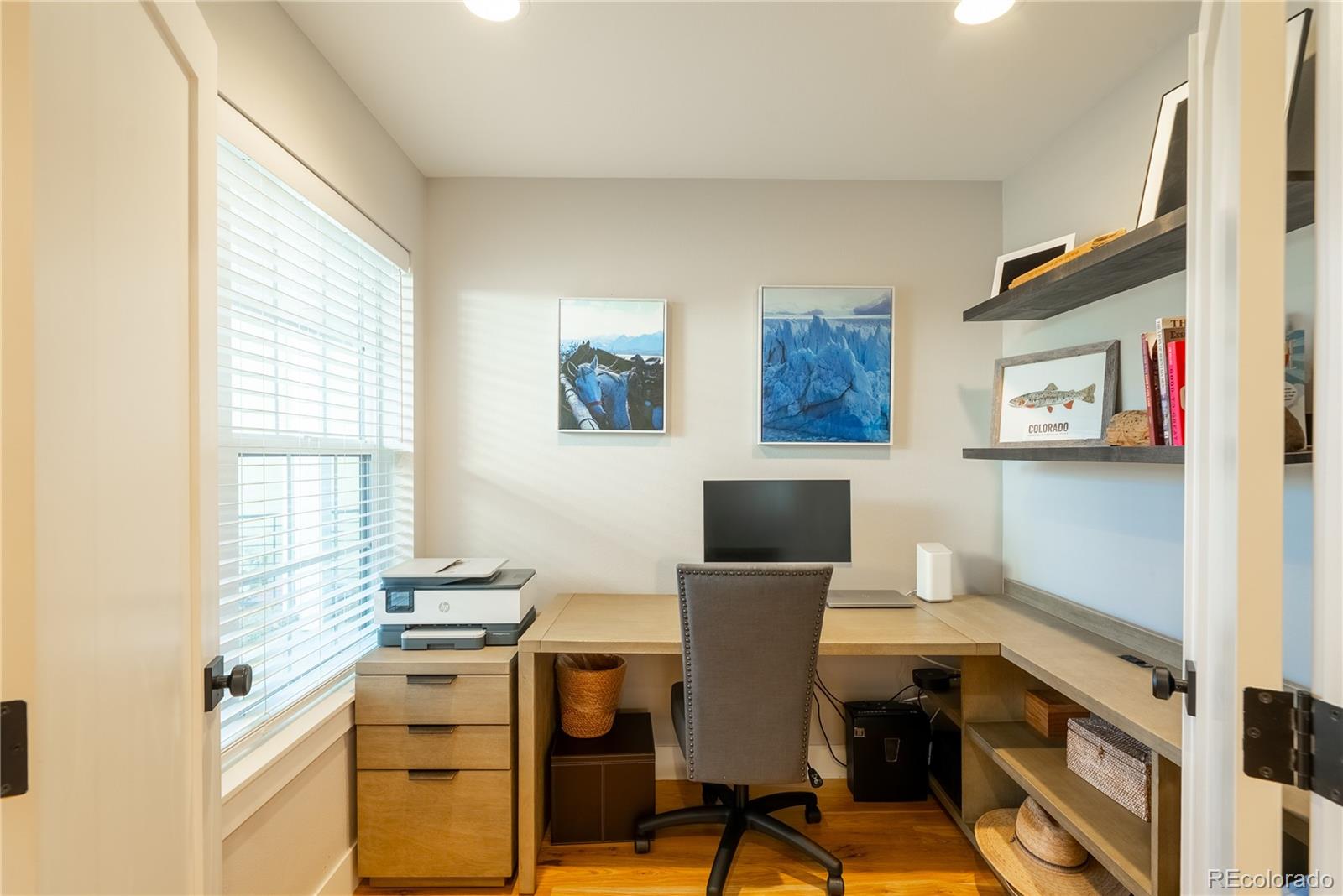 4035 Osage Street Denver, CO 80211 - Photo 10 of 29 a view of a workspace with furniture and a window