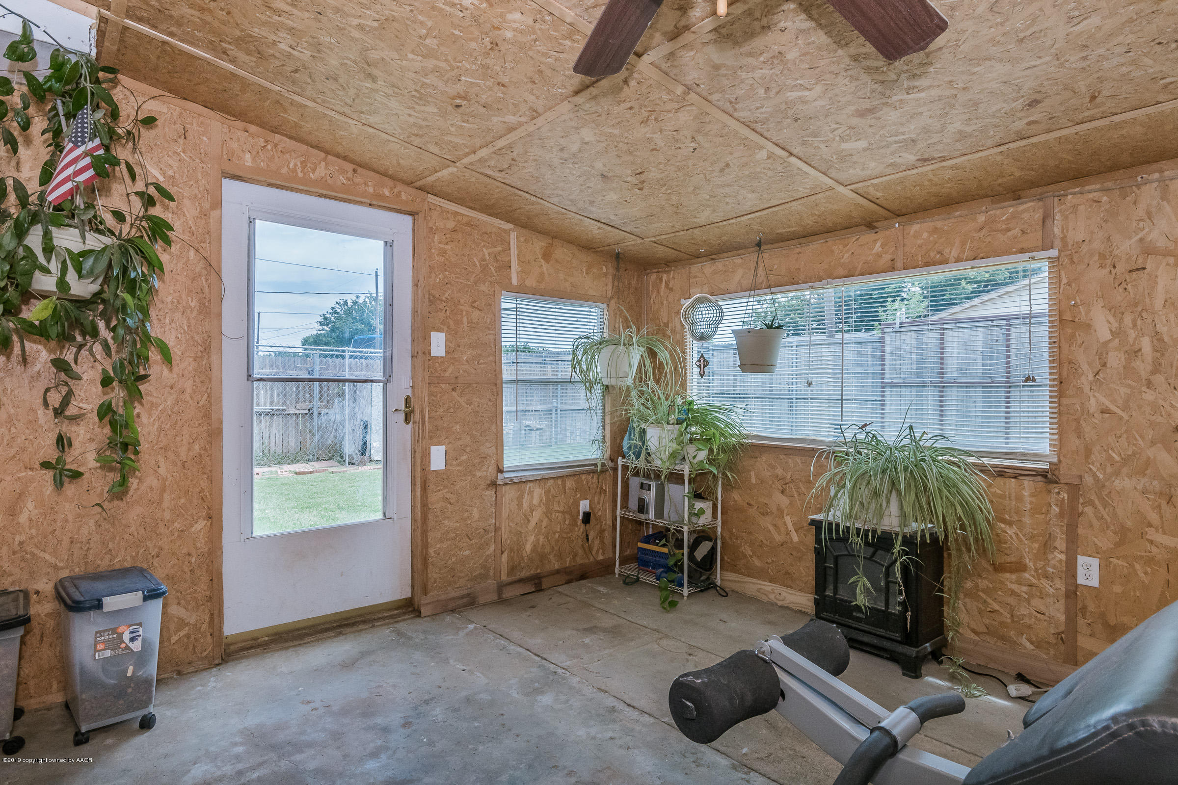 5145 McCarty Boulevard Amarillo, TX 79110 - Photo 6 of 21 a room with furniture and a fireplace