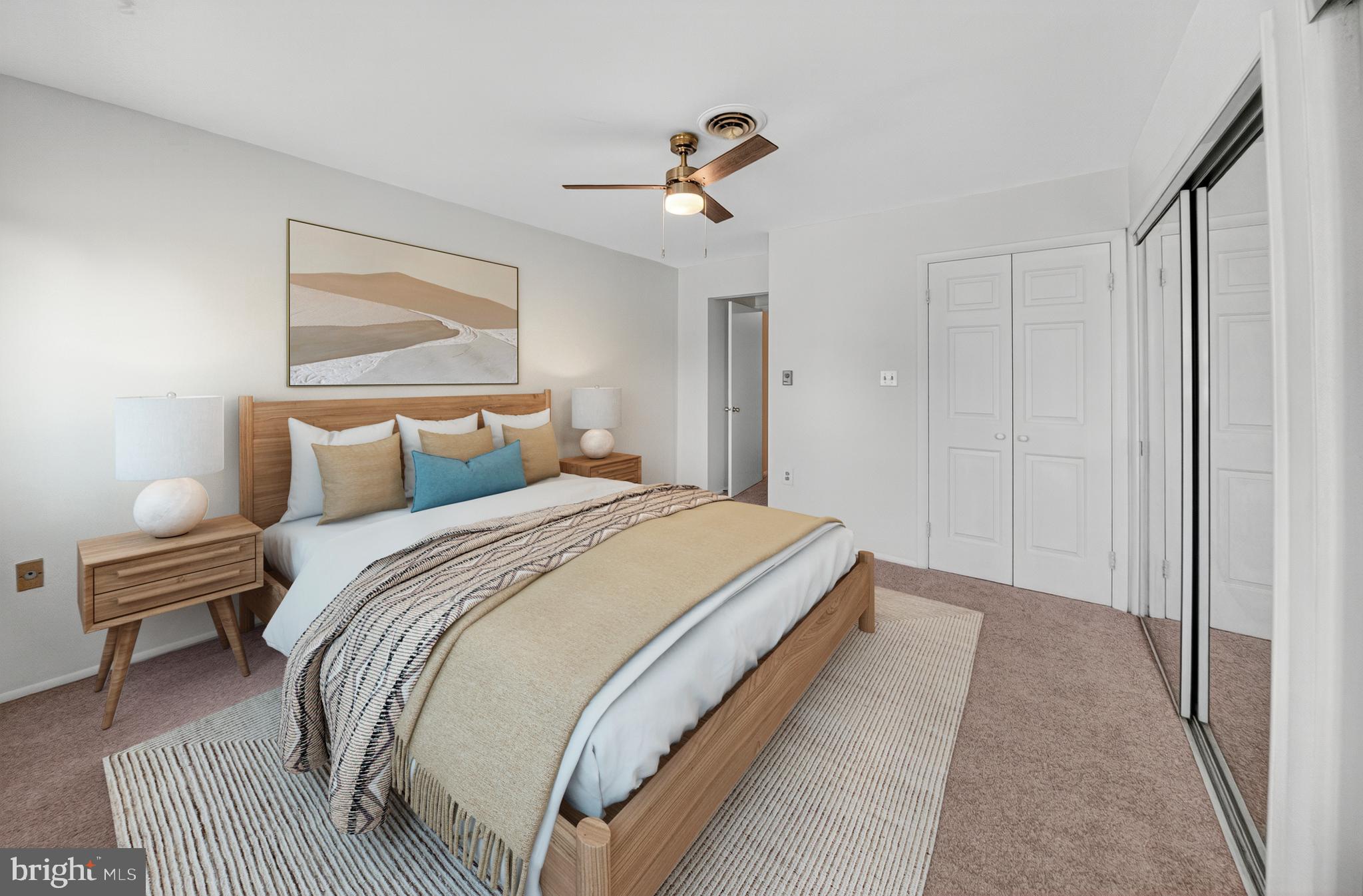 7043 Basswood Road Frederick, MD 21703 - Photo 14 of 34 a bedroom with a bed and a chandelier