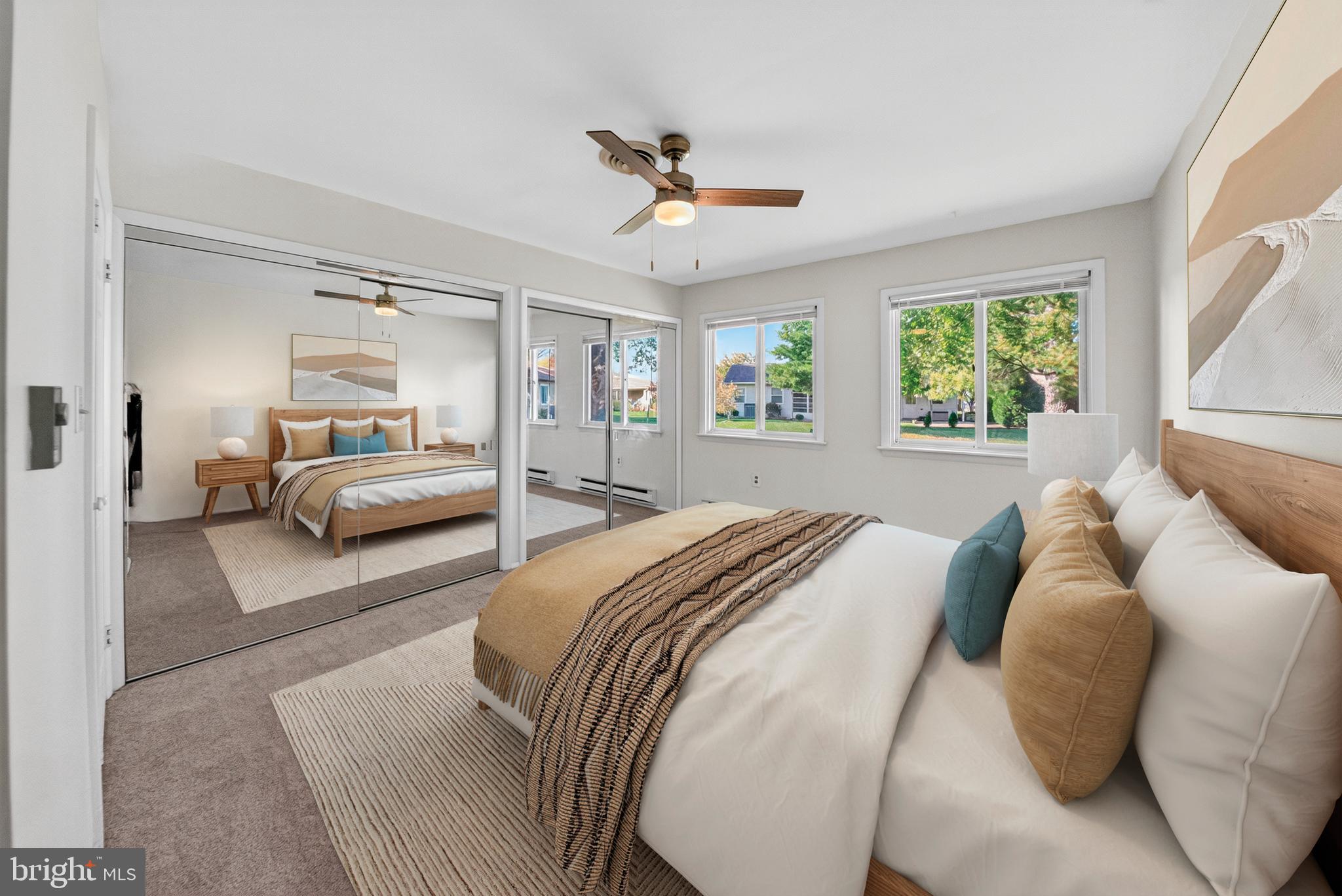 7043 Basswood Road Frederick, MD 21703 - Photo 15 of 34 a bedroom with a bed and a large window