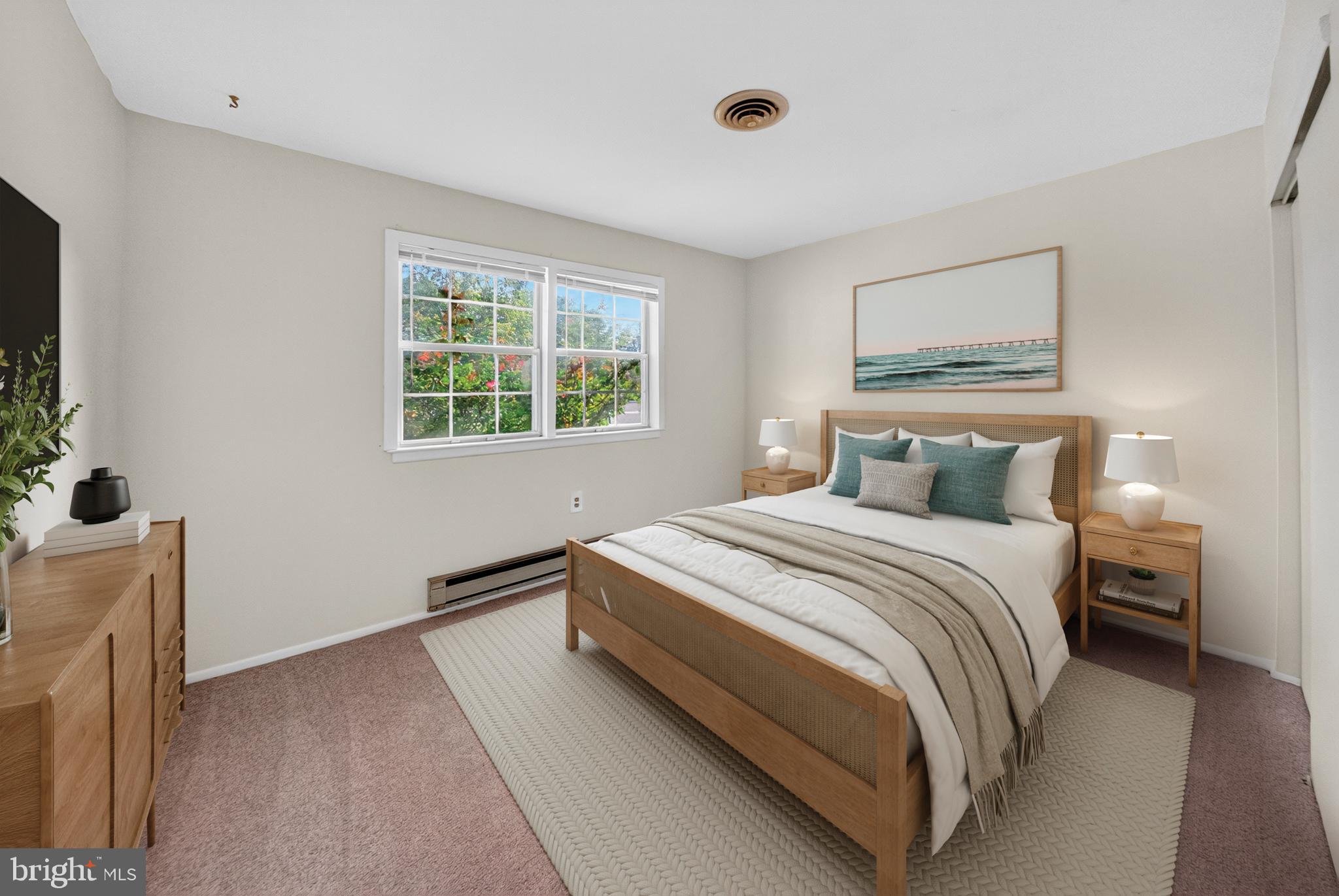 7043 Basswood Road Frederick, MD 21703 - Photo 17 of 34 a bedroom with a bed and a window