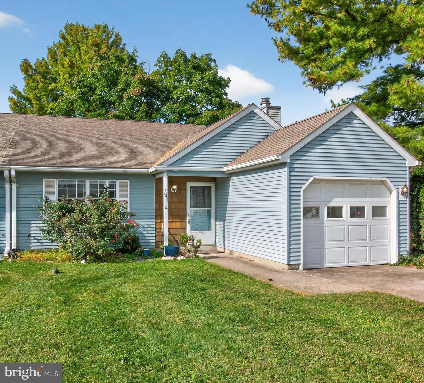 7043 Basswood Road Frederick, MD 21703 - Photo 2 of 34 front view of a house with a yard
