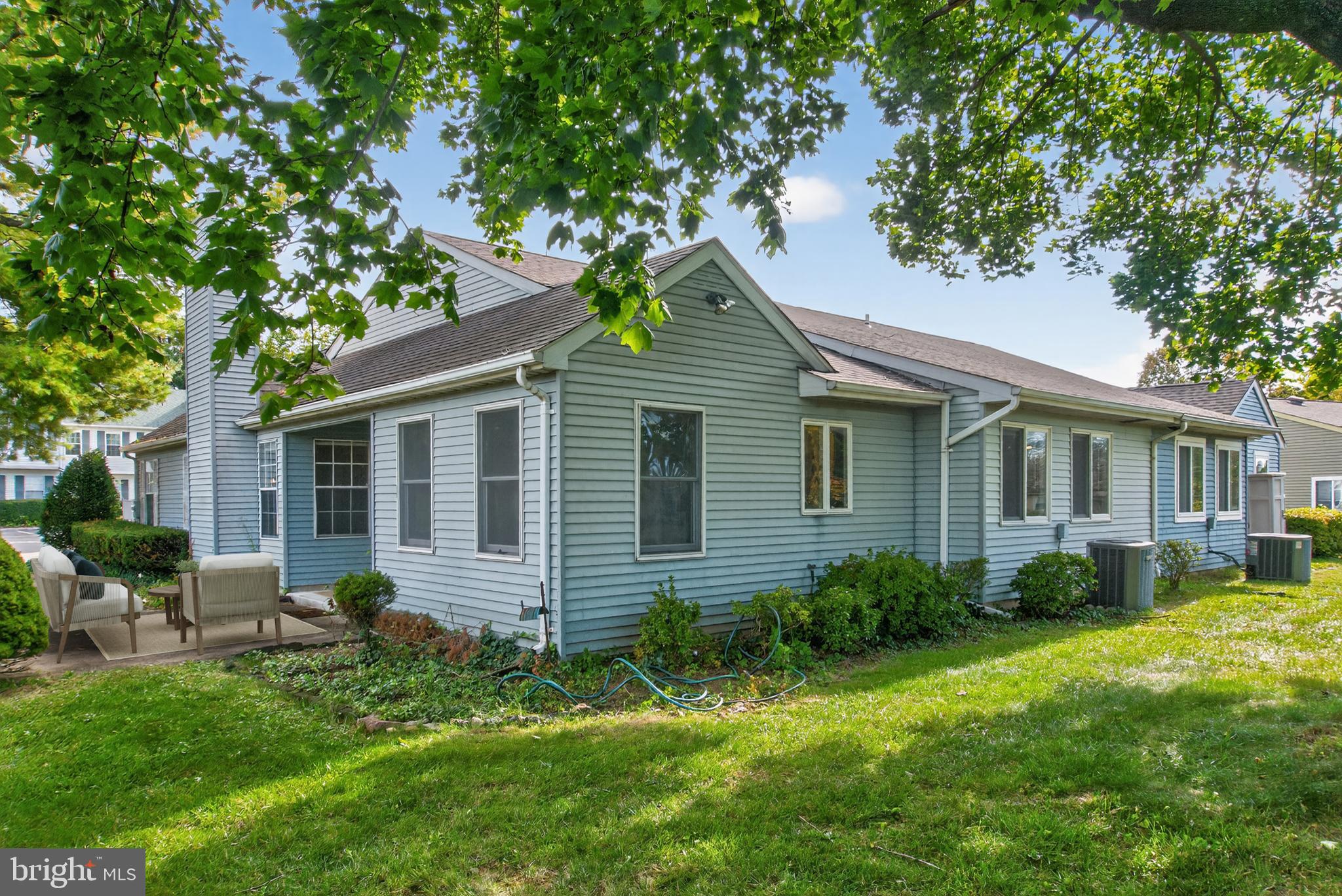 7043 Basswood Road Frederick, MD 21703 - Photo 22 of 34 a backyard of a house with table and chairs