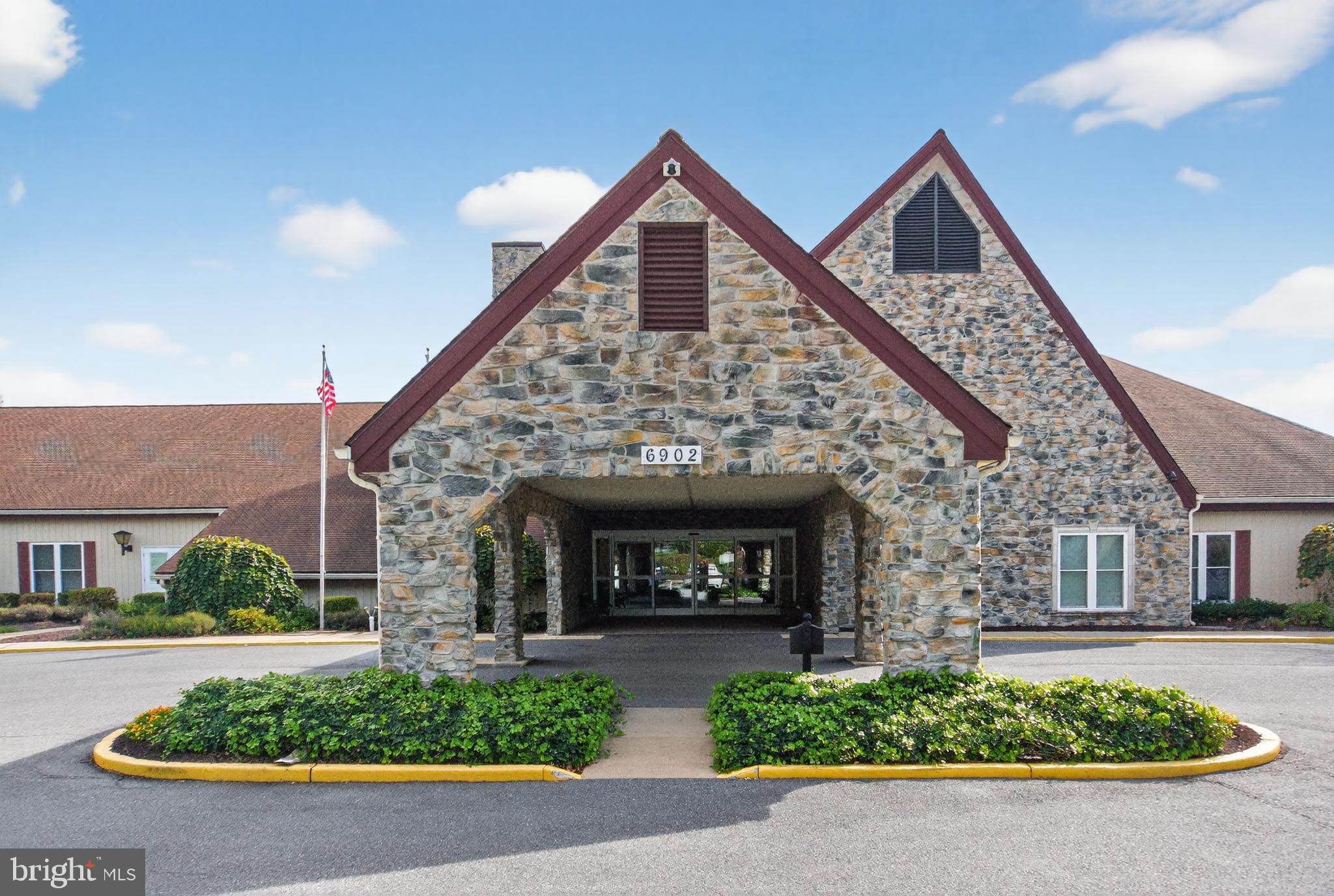 7043 Basswood Road Frederick, MD 21703 - Photo 26 of 34 a front view of a house with a yard