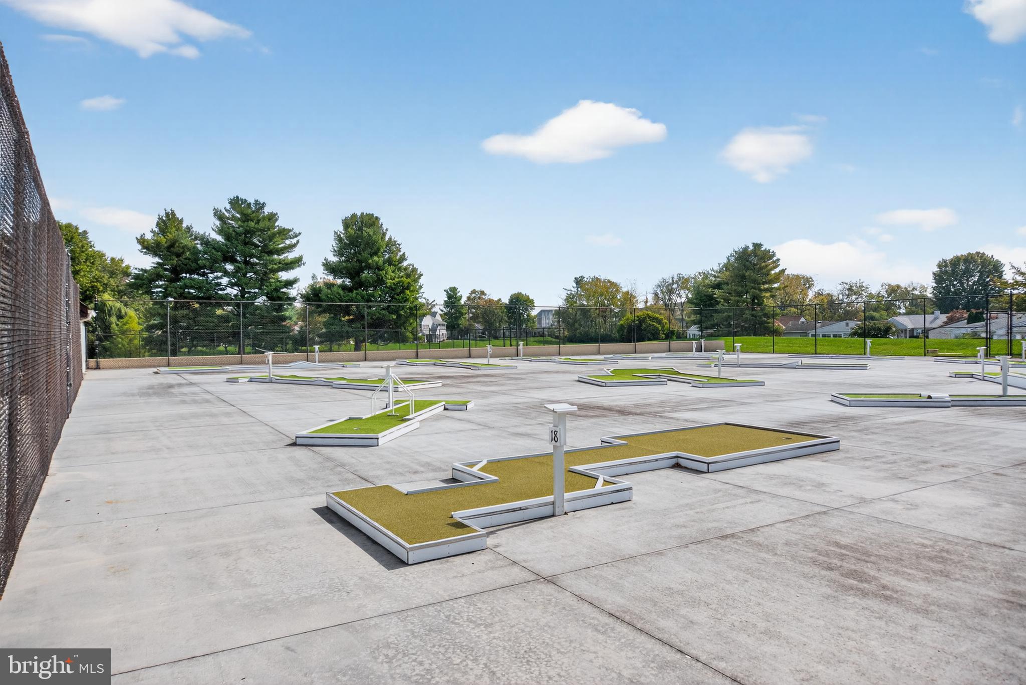 7043 Basswood Road Frederick, MD 21703 - Photo 30 of 34 a view of a swimming pool with a lounge chair