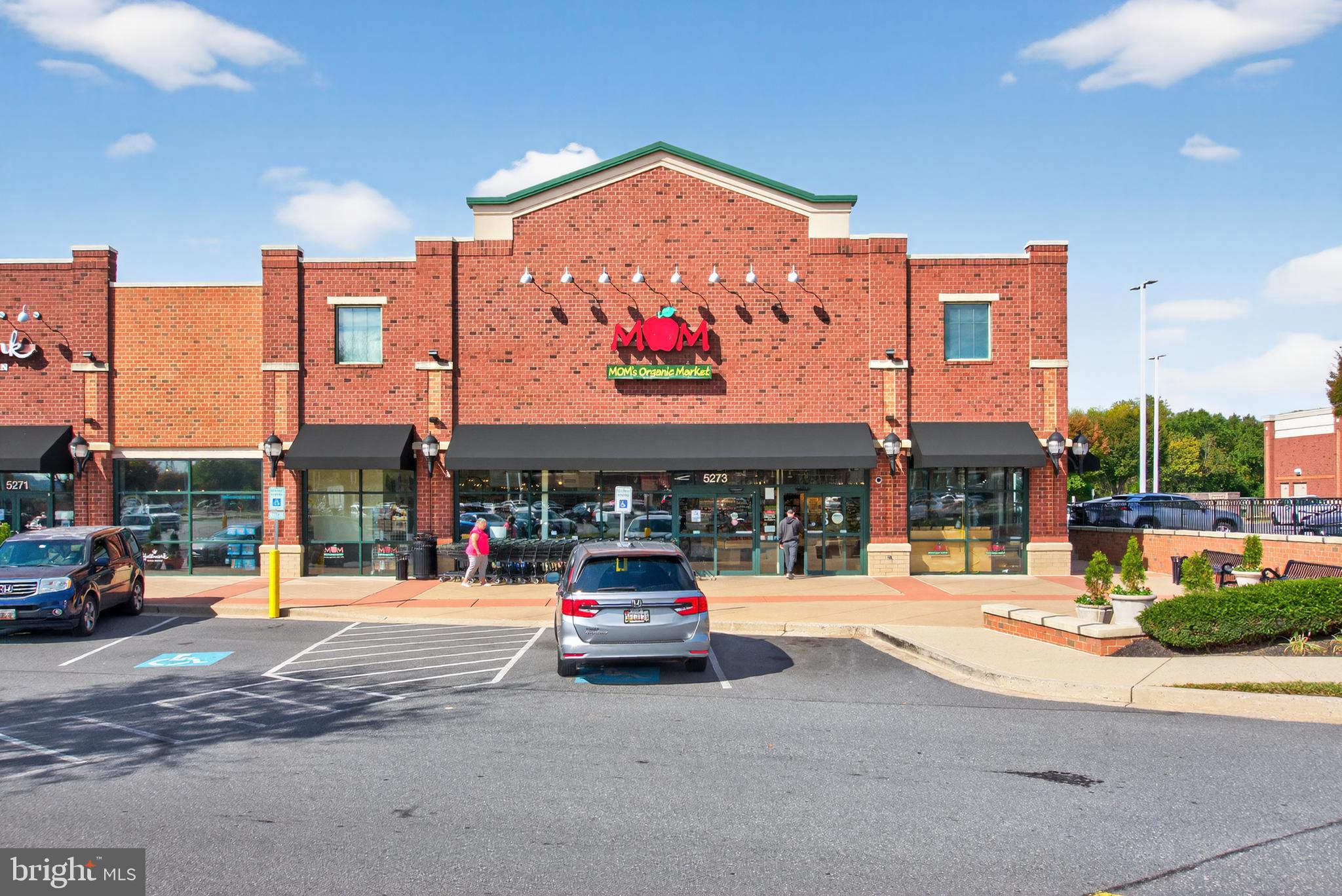 7043 Basswood Road Frederick, MD 21703 - Photo 31 of 34 a outdoor view of a building with traffic