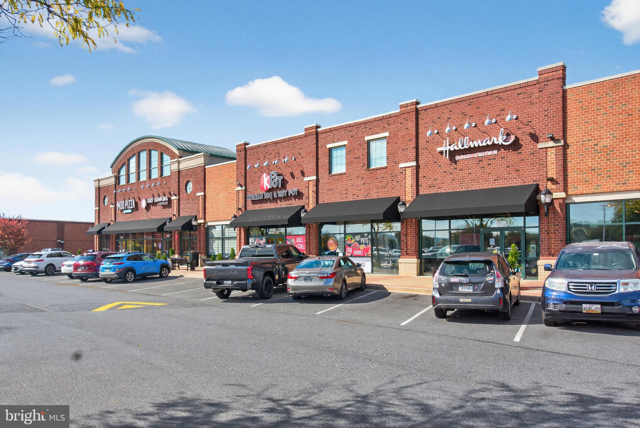 7043 Basswood Road Frederick, MD 21703 - Photo 33 of 34 a car parked in front of a building