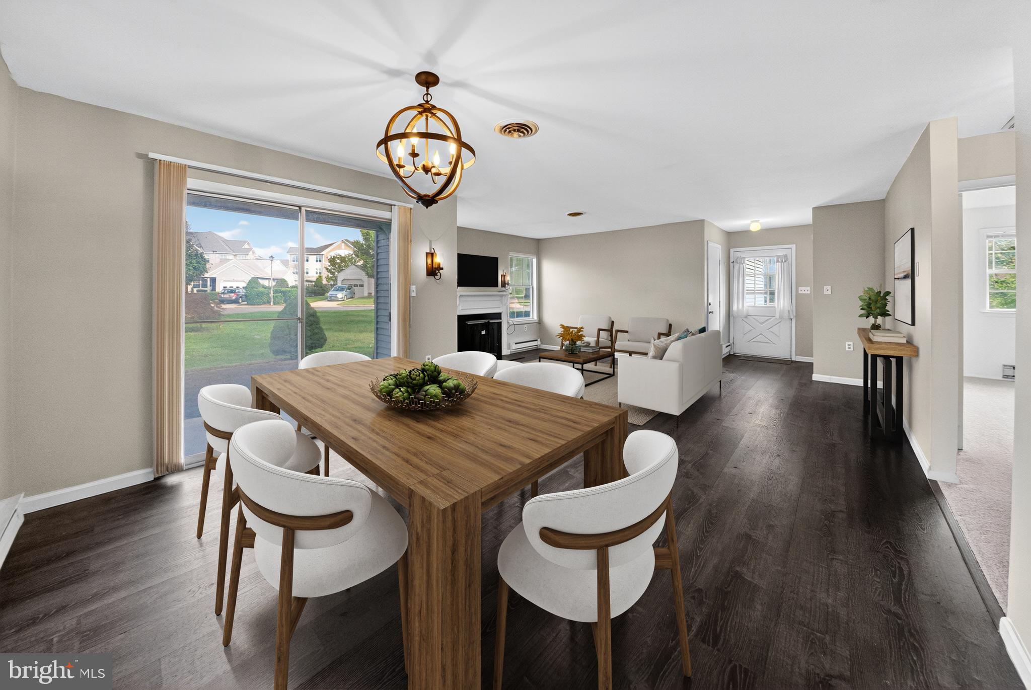 7043 Basswood Road Frederick, MD 21703 - Photo 8 of 34 a view of a dining room with furniture window and wooden floor