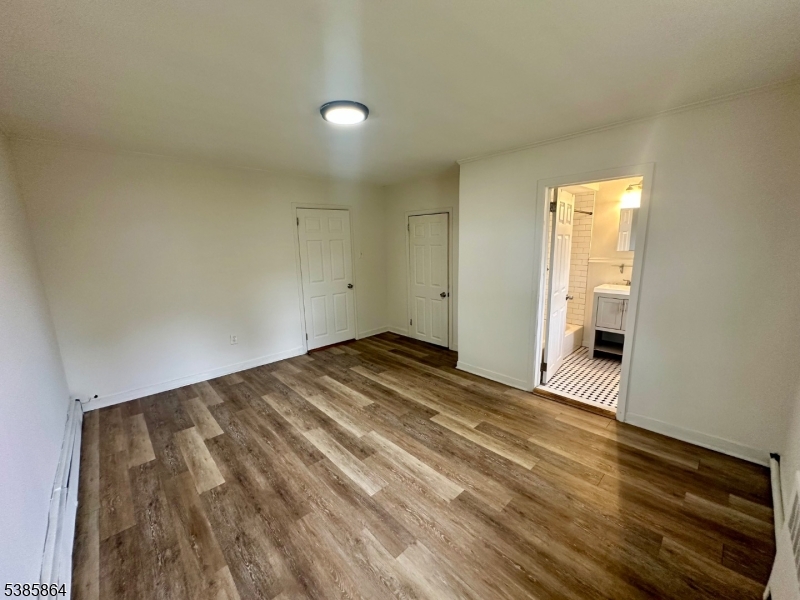 390 Orange Road, Unit 2 Montclair, NJ 07042 - Photo 9 of 16 a view of empty room with wooden floor