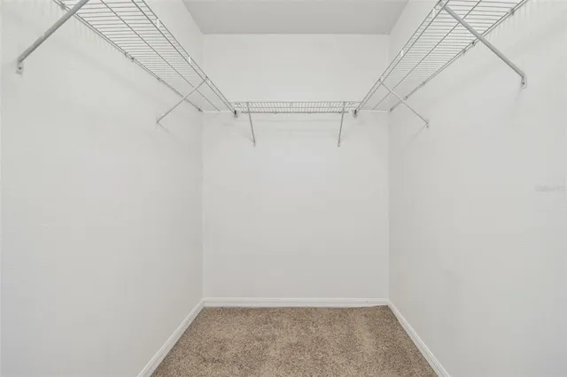 a view of a room with racks on the wall