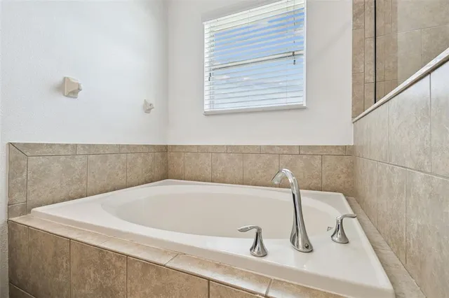 a bathroom with a bathtub