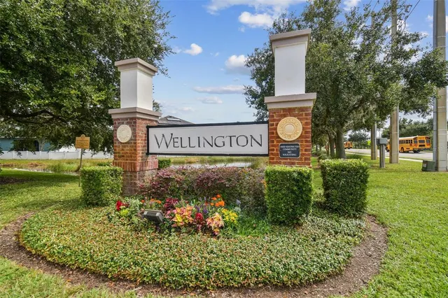a view of a street sign of a house