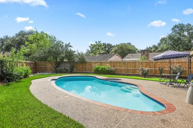 a view of outdoor space yard swimming pool and patio