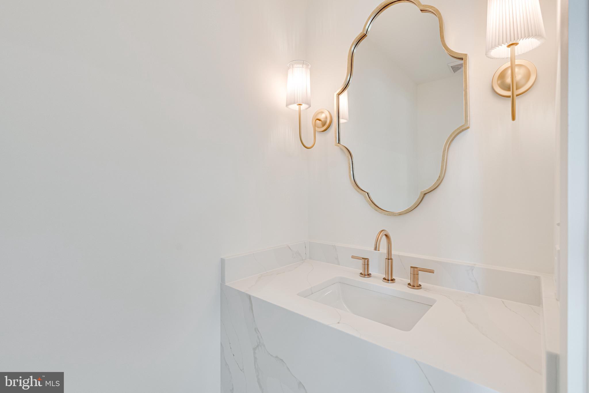 4820 5th Street Northwest Washington, DC 20011 - Photo 6 of 34 Custom vanity in main level guest 1/2 bath.