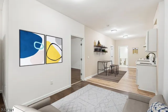 a kitchen with sink and cabinets